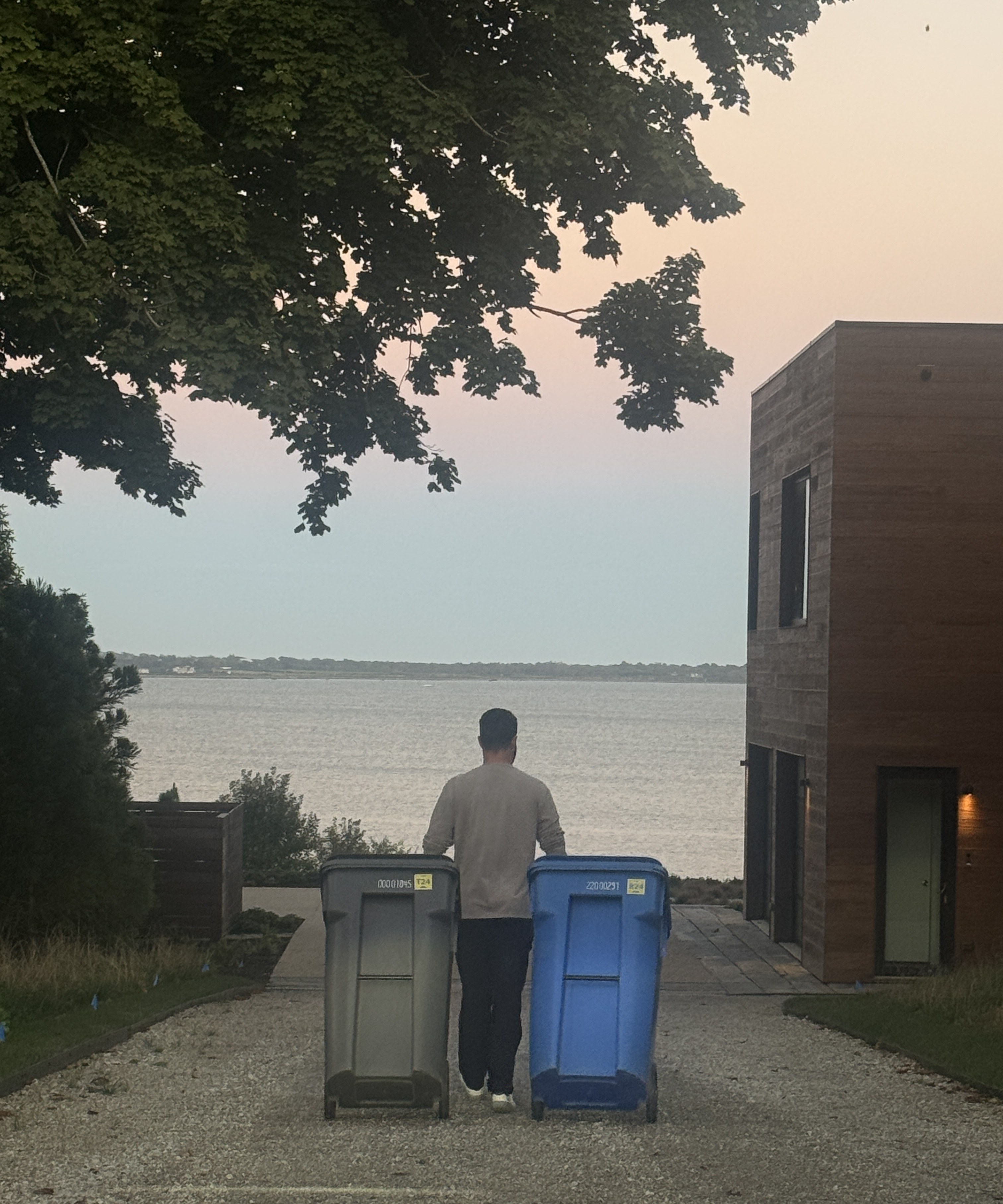 TK Bin Valet rolling trash and recycling bins at a Newport Rhode Island property